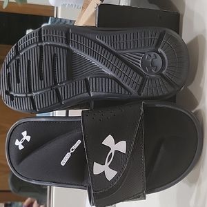 Boys black under armour slip on sandles. Size 12K